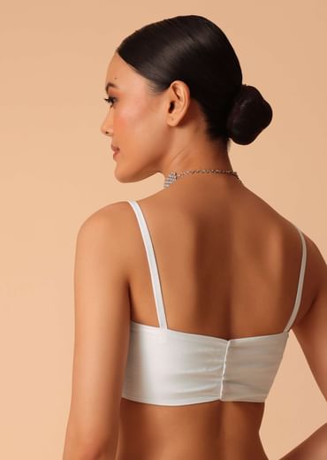 White Saree In Organza With Floral Motif Border And Unstitched Blouse Piece White Saree In Organza With Floral Motif Border And Unstitched Blouse Piece