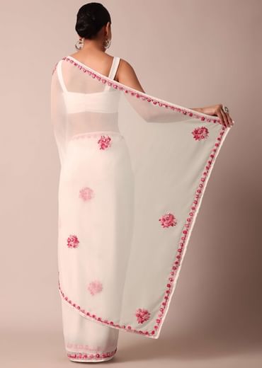White saree with floral embroidery and unstitched blouse