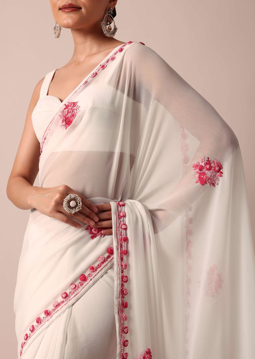 White Saree With Floral Embroidery And Unstitched Blouse Piece
