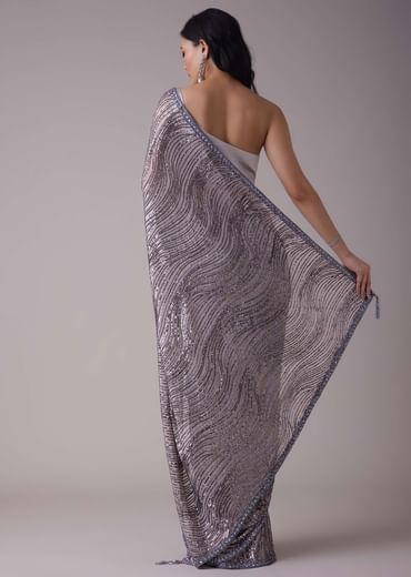 Lavender Purple Sequins Saree With An Embellished Border