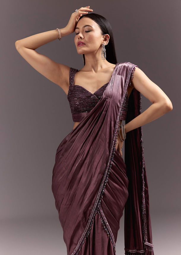 Wine Frill Drape Cutdana Saree With Sleeveless Overlap Blouse Wine Frill Drape Cutdana Saree With Sleeveless Overlap Blouse
