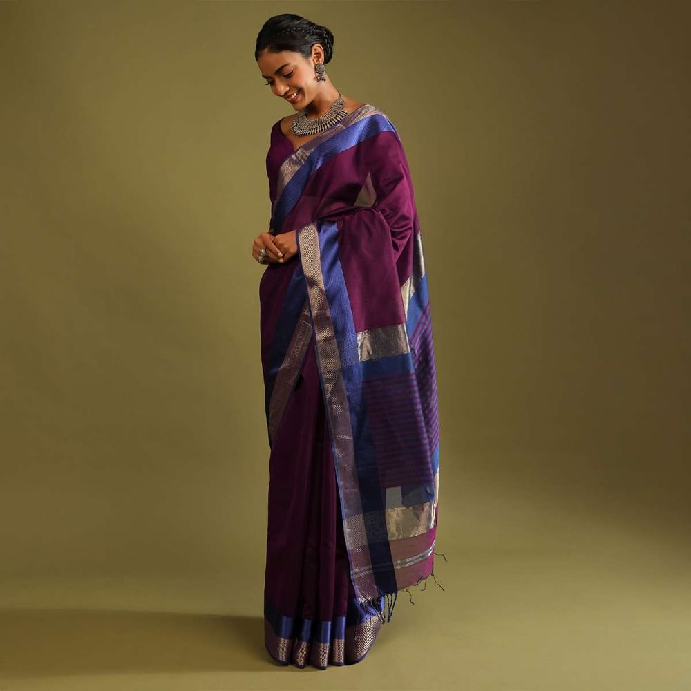 Wine Saree In Tussar Silk With Gold And Blue Woven Border And Striped Pallu Design